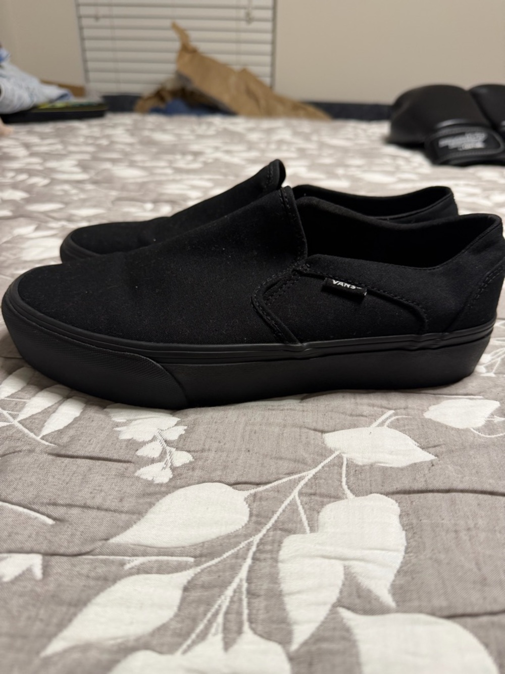 Vans All-Black Slip-On Platform Canvas Sneakers